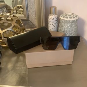 Burberry sunglasses black with white Burberry lettering